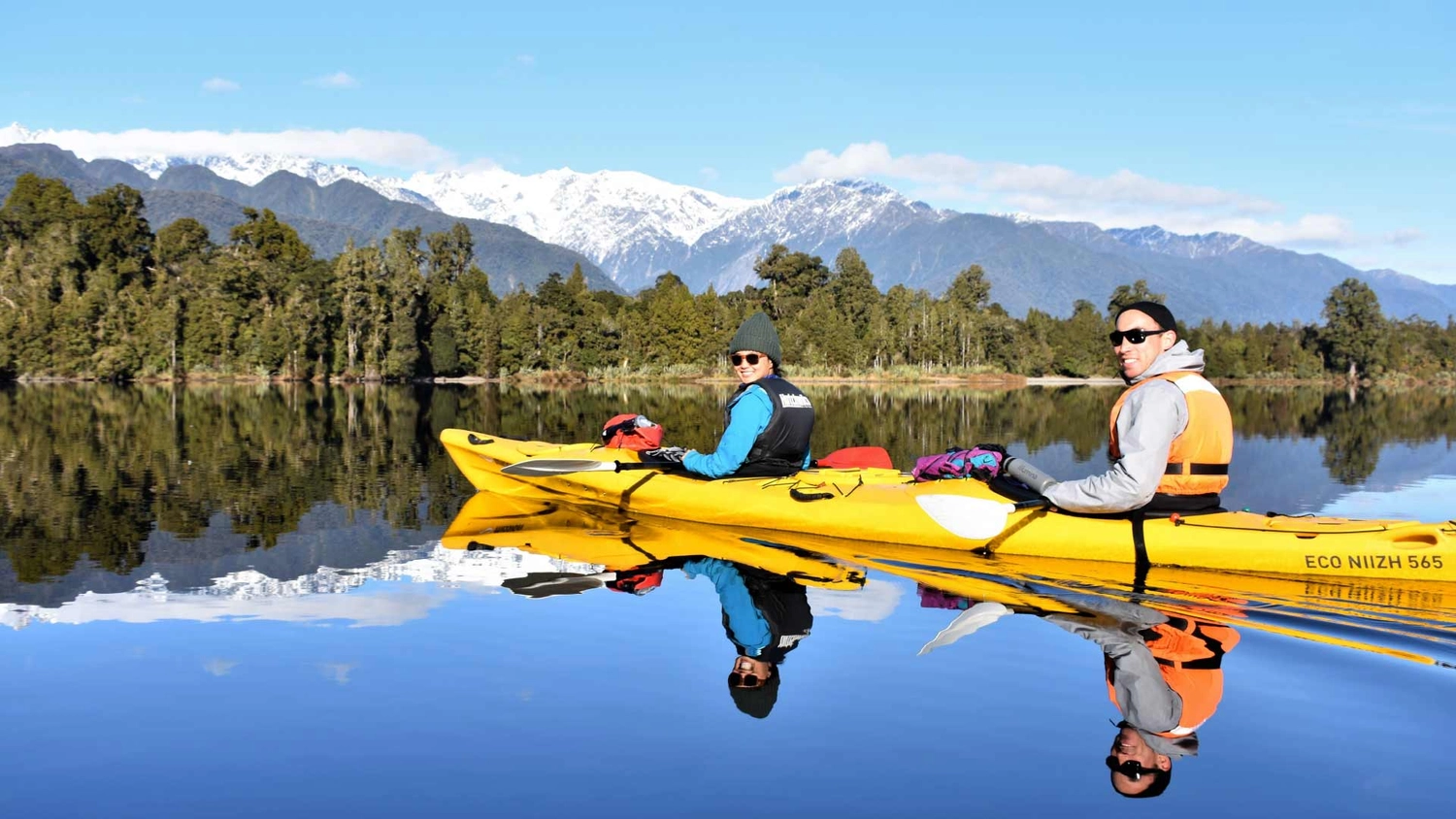 People tandem kayaking at Franz Josef