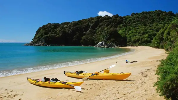 Kayaks on the beach at Abel Tasman National Park