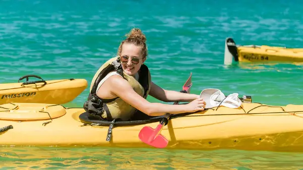 Woman sitting in a kayak