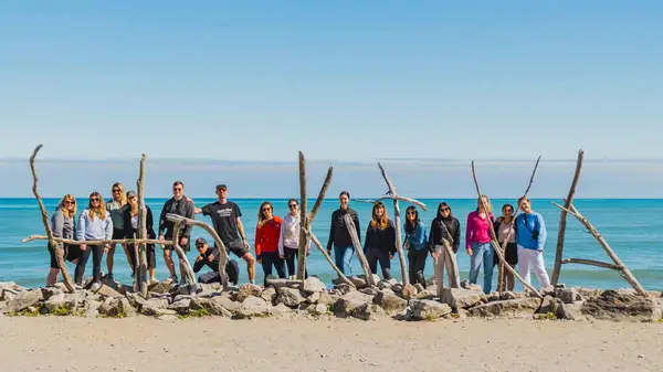 Group of people on the beach in Hokitika