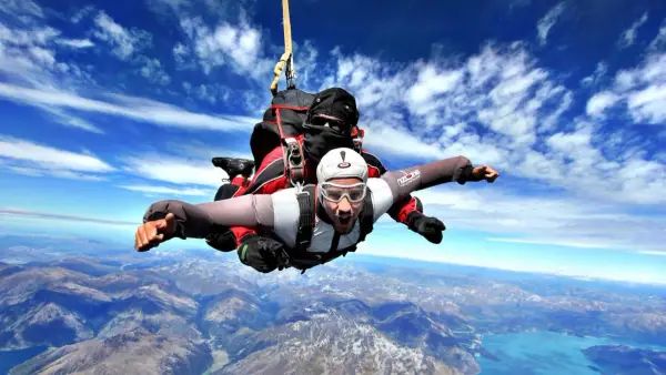 Tandem skydivers over Queenstown