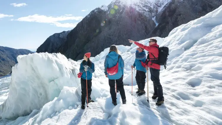 Group of people on a guided glacier tour of Franz Josef