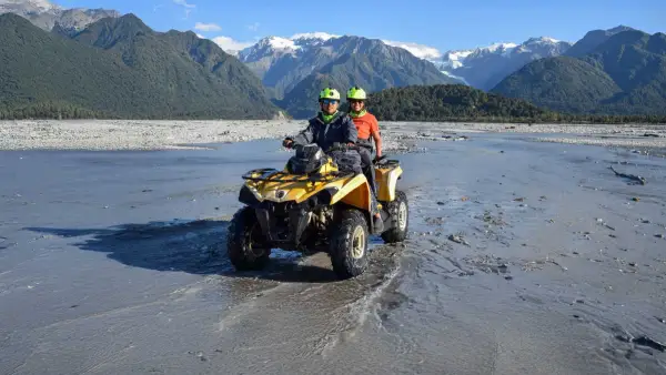 Two people quad biking in Franz Josef