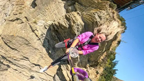 Woman bungy jumping in Queenstown