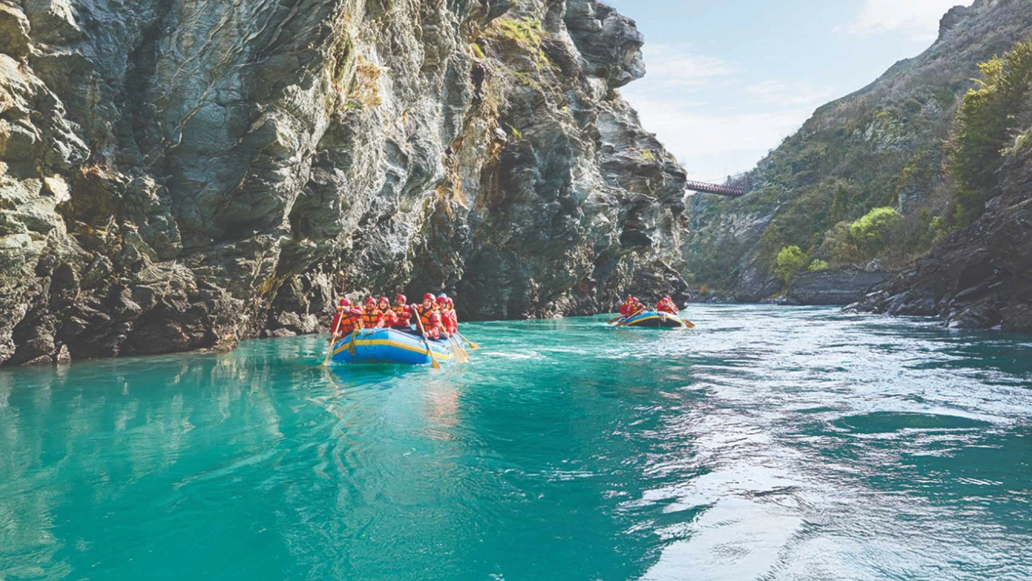 Groups rafting in Queenstown