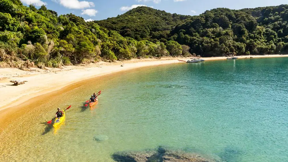 Two people kayaking at Abel Tasman National Park