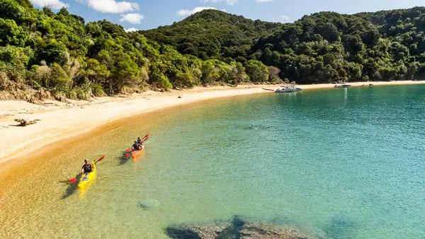 Two people kayaking in Abel Tasman National Park