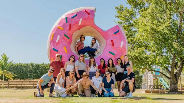 Group of people at the donut statue in Springfield