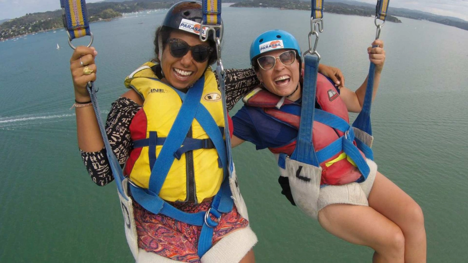 Two people parasailing in Paihia