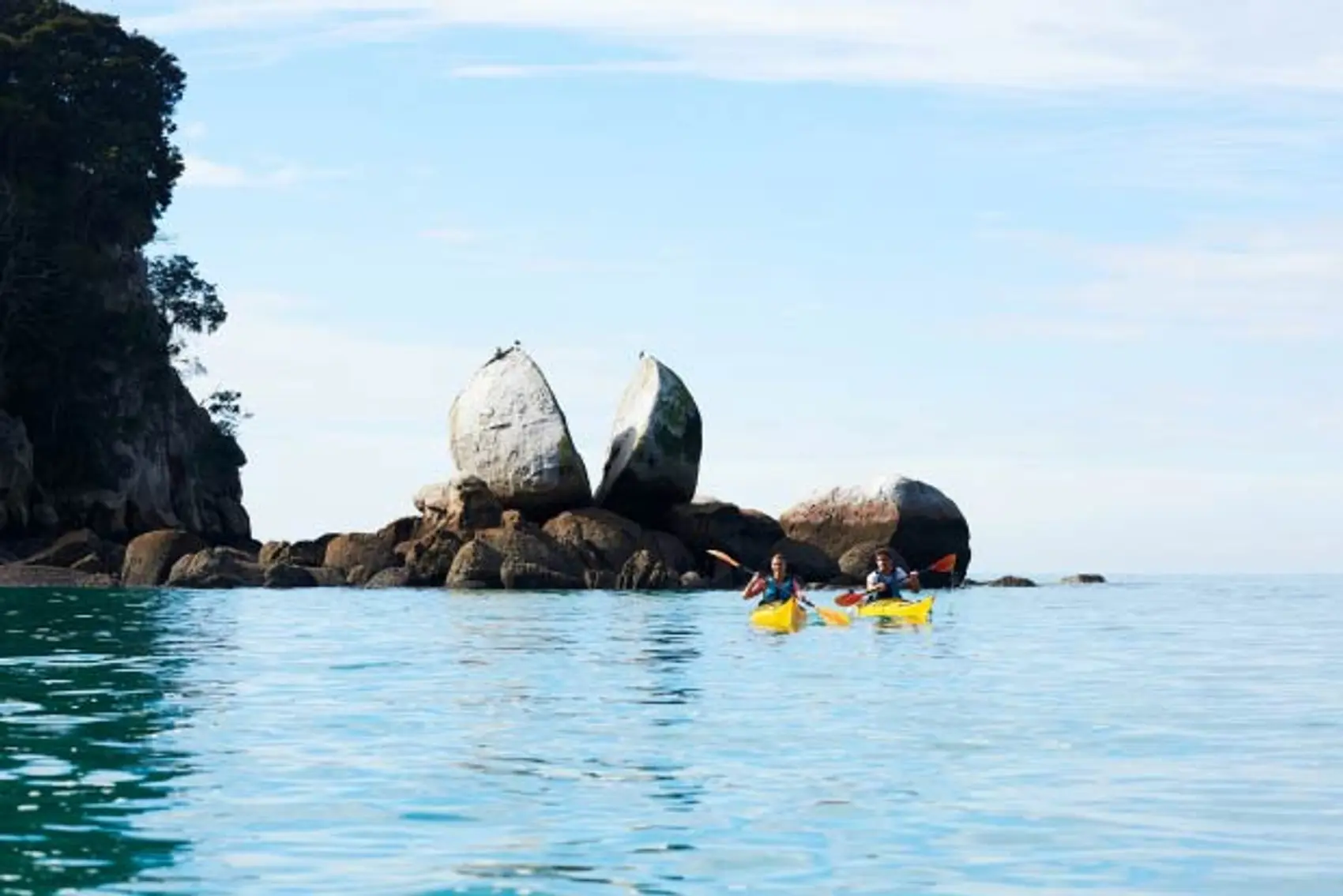 Two people kayaking Abel Tasman National Park