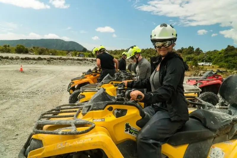 Wild Kiwi guests quad biking in Franz Josef