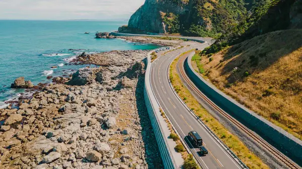 Wild Kiwi bus driving the coast near Kaikoura