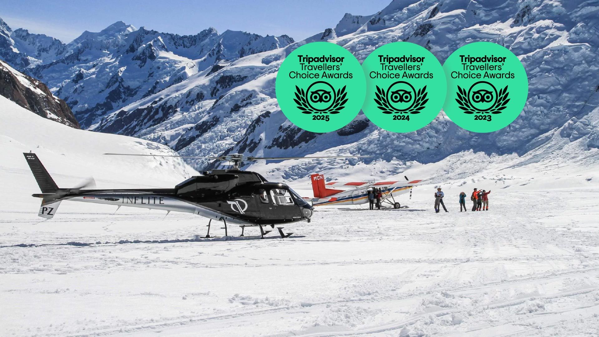 Helicopter and ski plane on a glacier