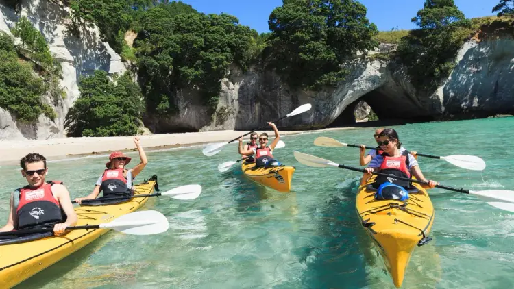 Friends kayaking at Abel Tasman