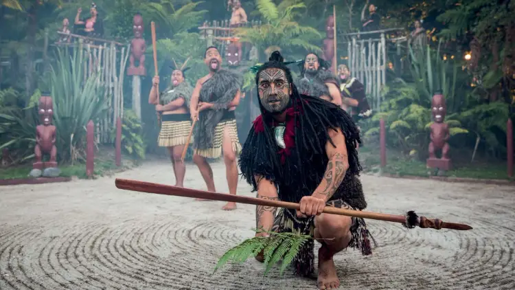 Maori man welcomes visitors