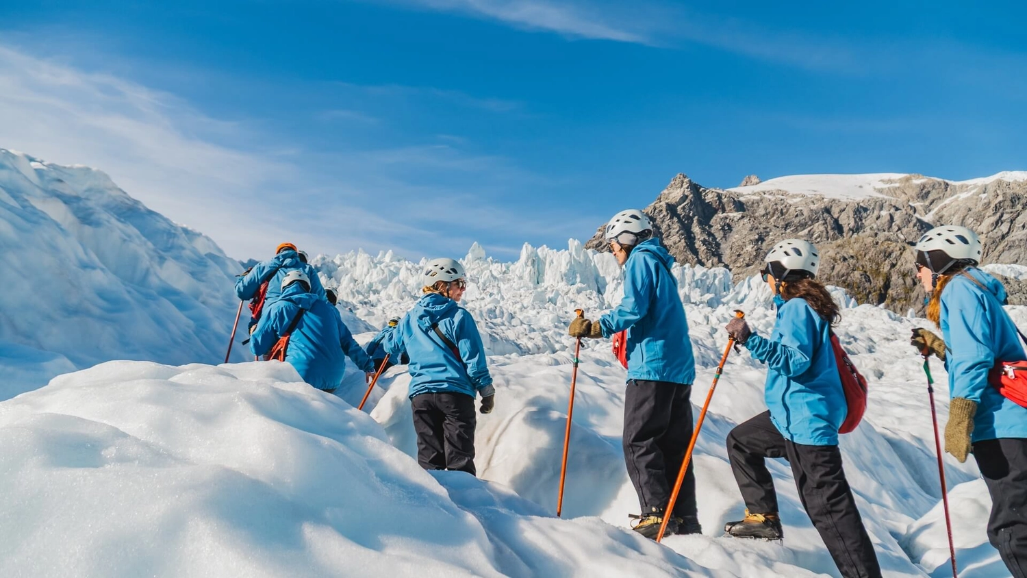 A group of people on a glacier hike in Franz Josef New Zealand