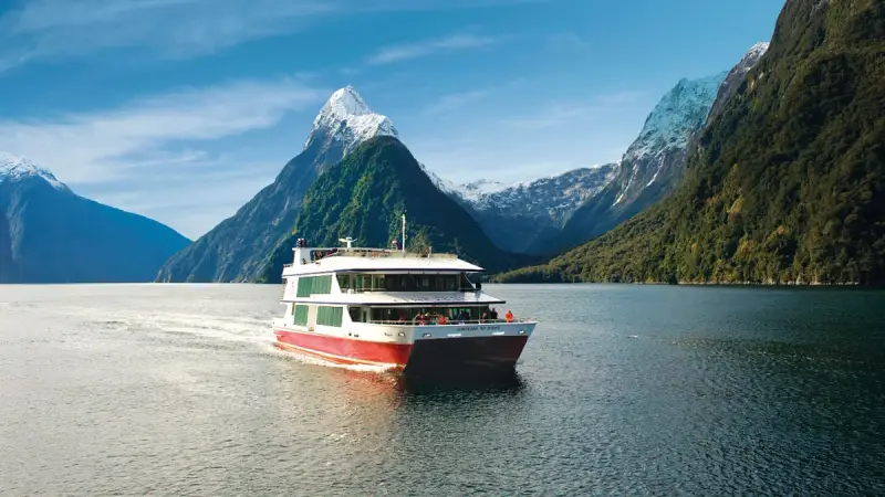 Boat cruising in Milford Sound