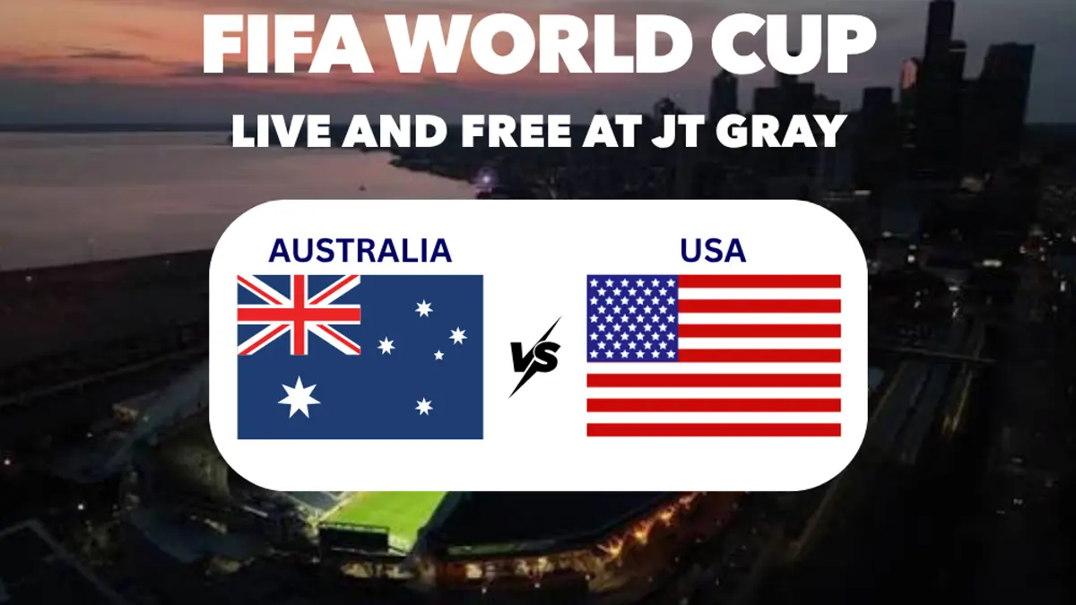 photo of Australian and US flags against back drop of Seattle Stadium