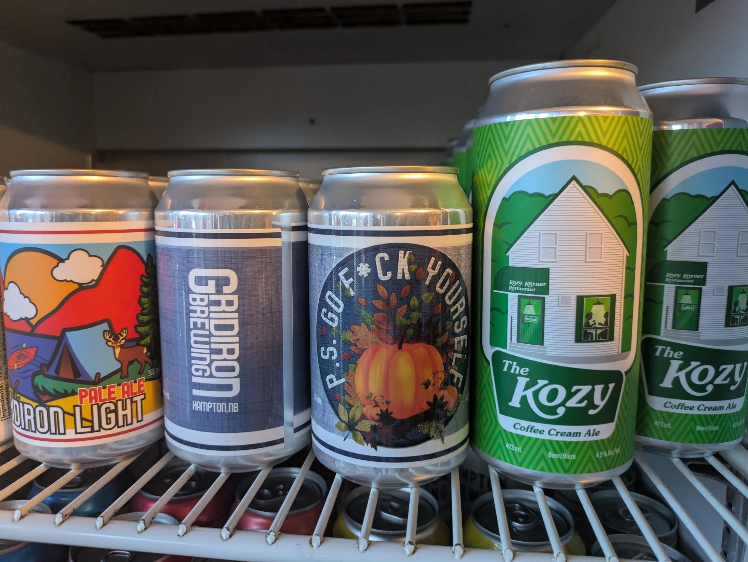 Gridiron cans on the fridge