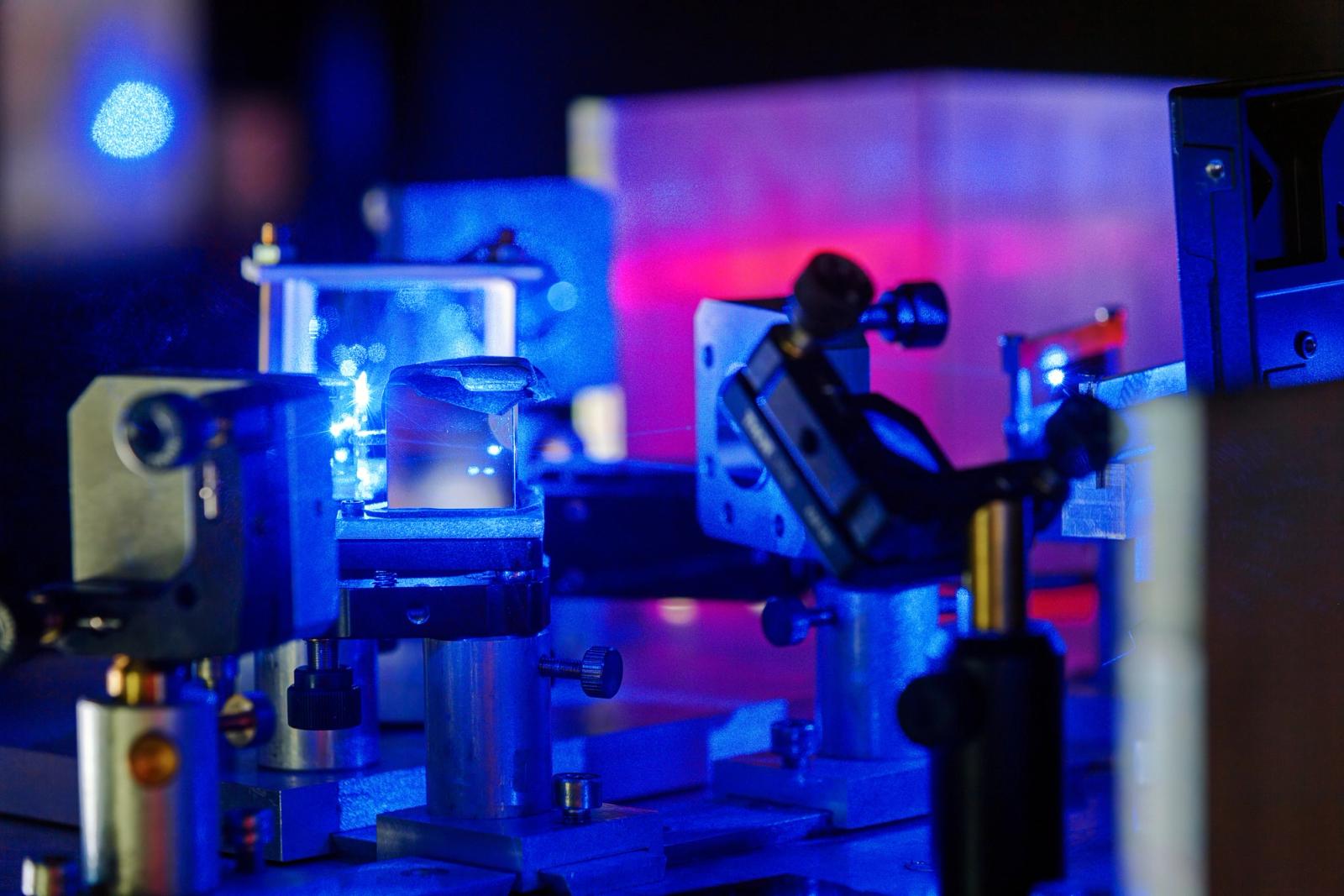 Blue laser light in an optics research laboratory