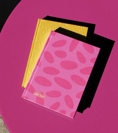 Two patterned book designs on a table