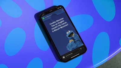 Sesame Street Instagram story design with a picture of Cookie Monster and words that read "Cookie Monster has an English cousin! His name is biscuit monster!"