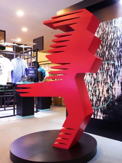 New Balance retail installation with large red Strata sculpture