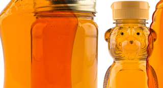 A collection of white labeled honey