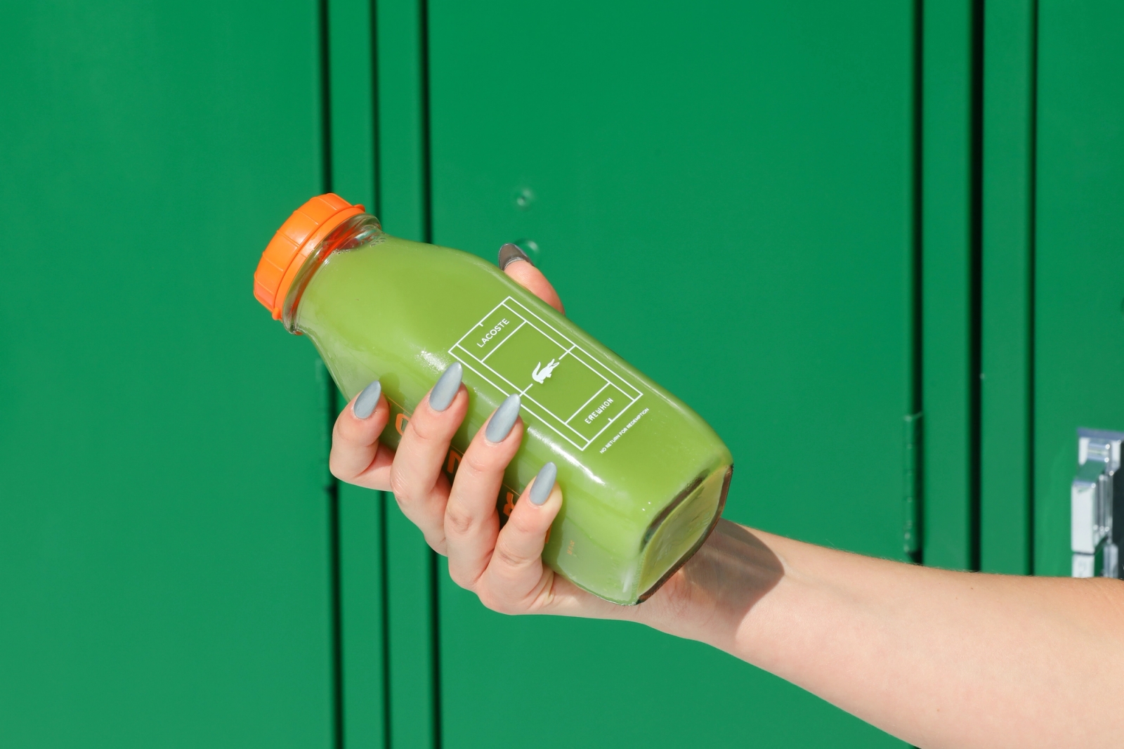Erewhon Lacoste custom juice bottle, nails, green locker