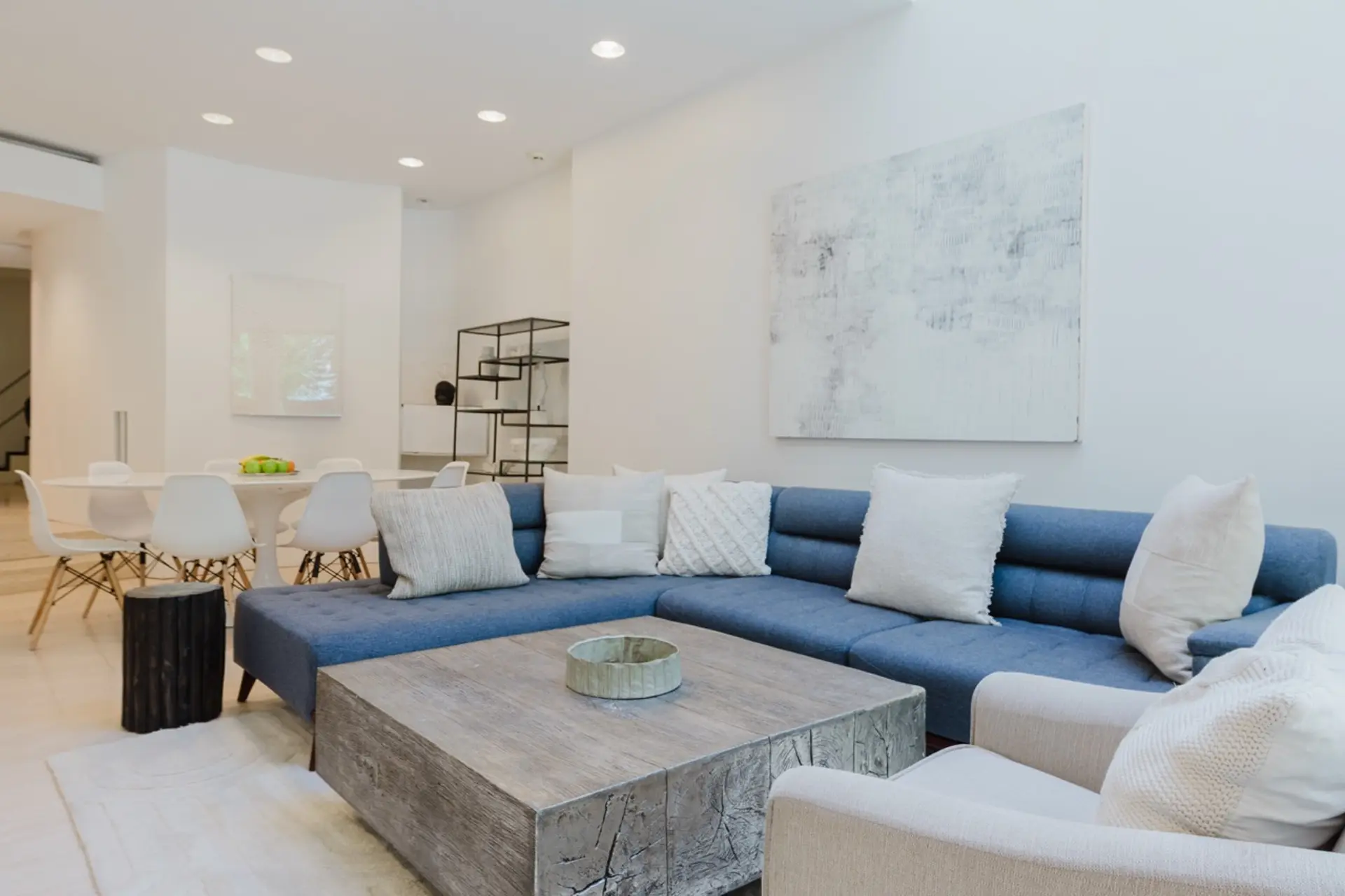 Luxurious, grand and comfortable living room with designer furniture flooded in light