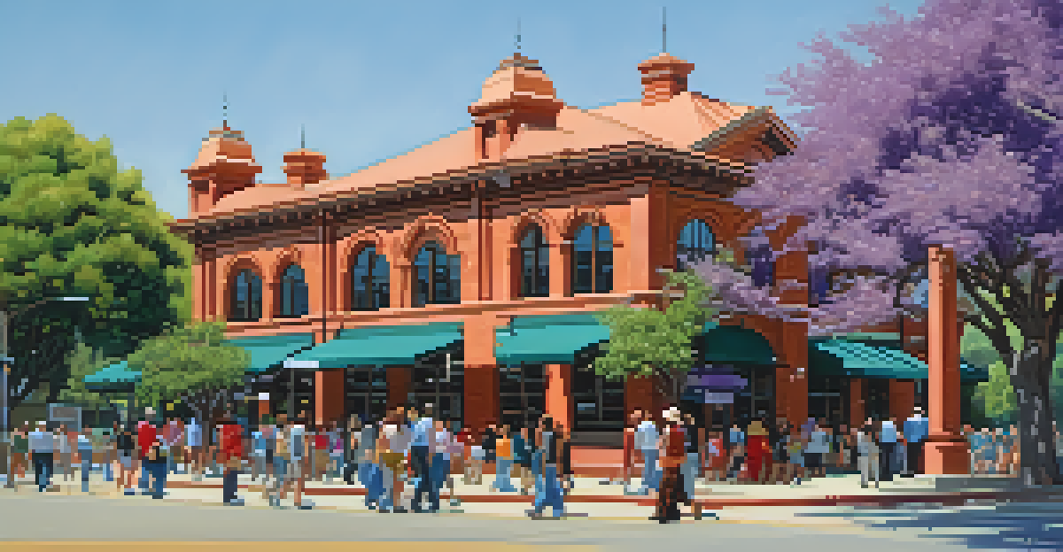 The Santa Fe Depot in Pasadena surrounded by blooming jacaranda trees on a sunny day.