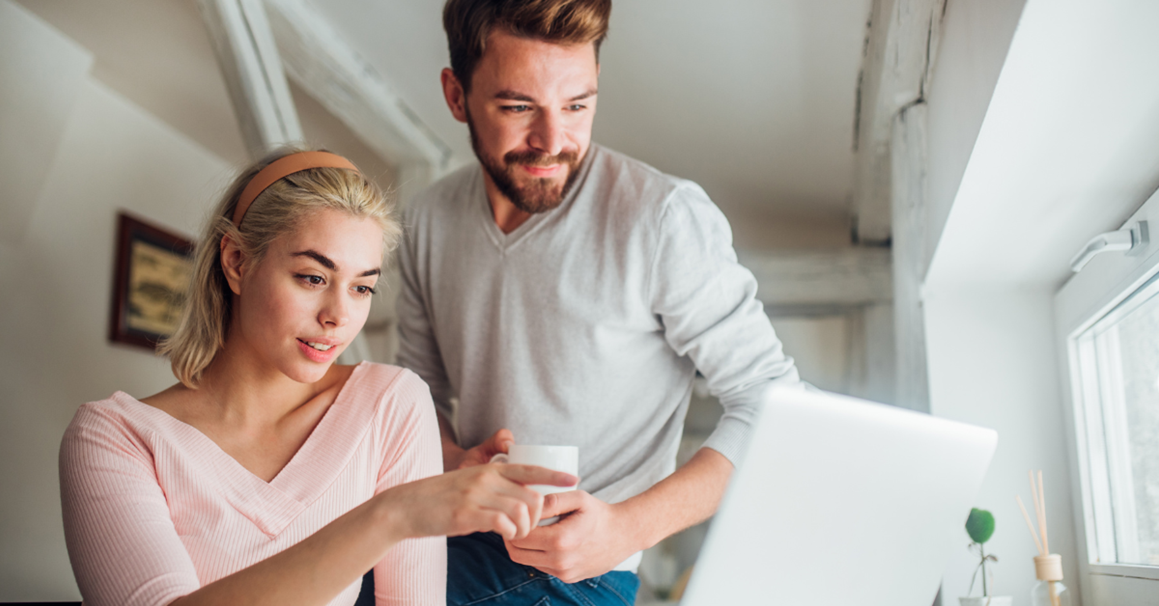 Couple looking at computer
