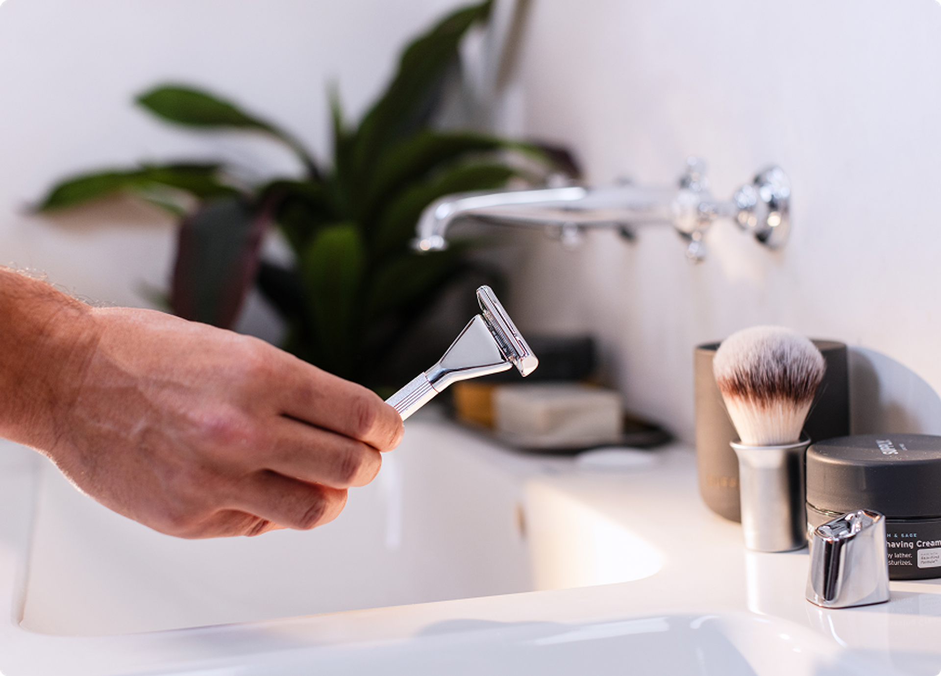 razor in bathroom by makeup brush