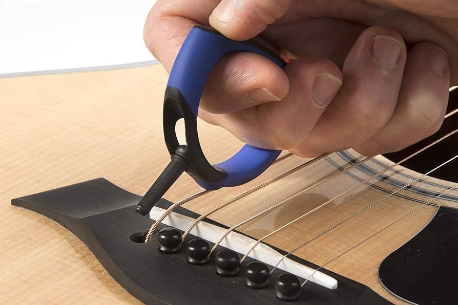 guitar neck with accessory tool