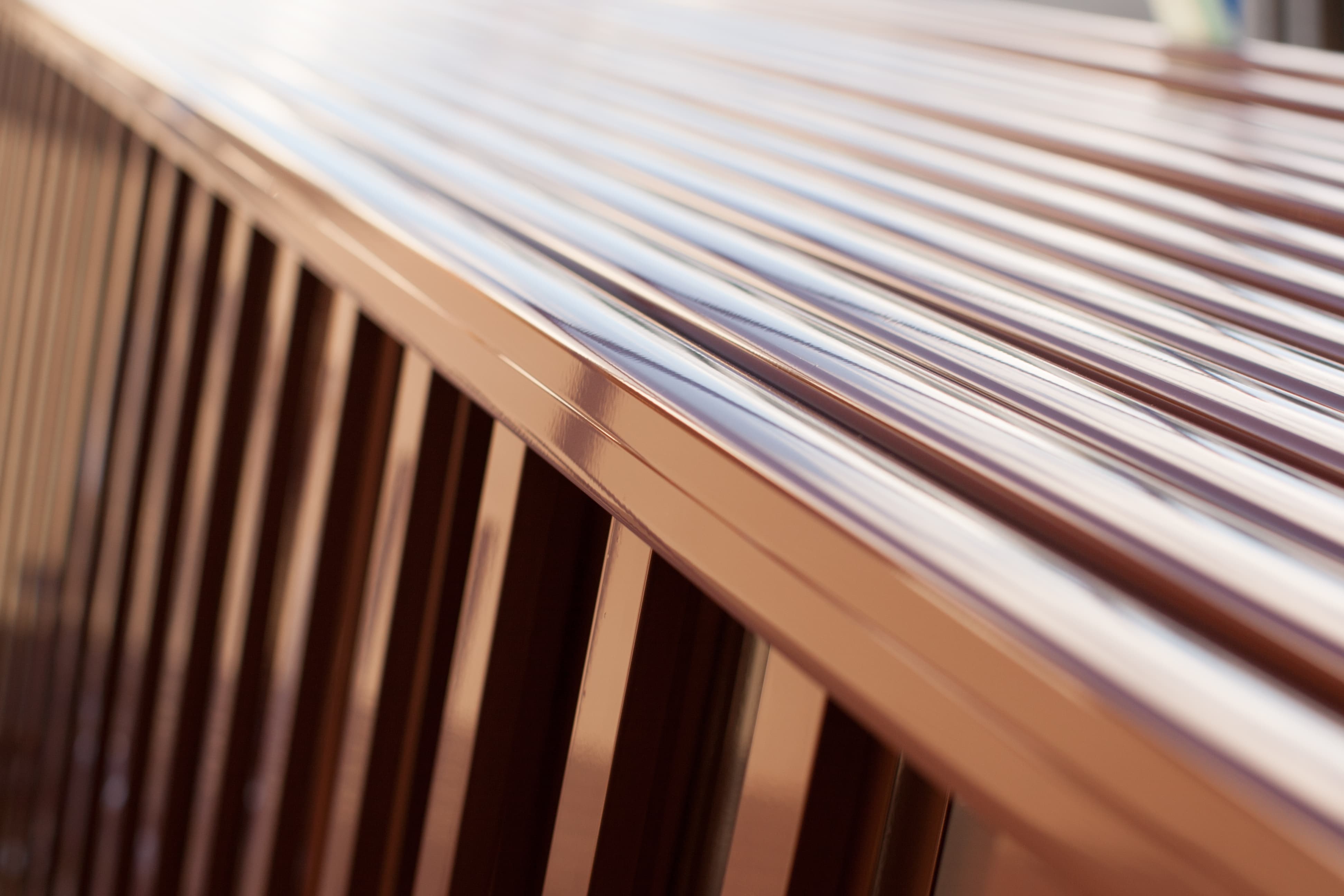 Close-up of AAMA 2604 powder coated aluminum railing showing smooth durable finish on top rail and pickets