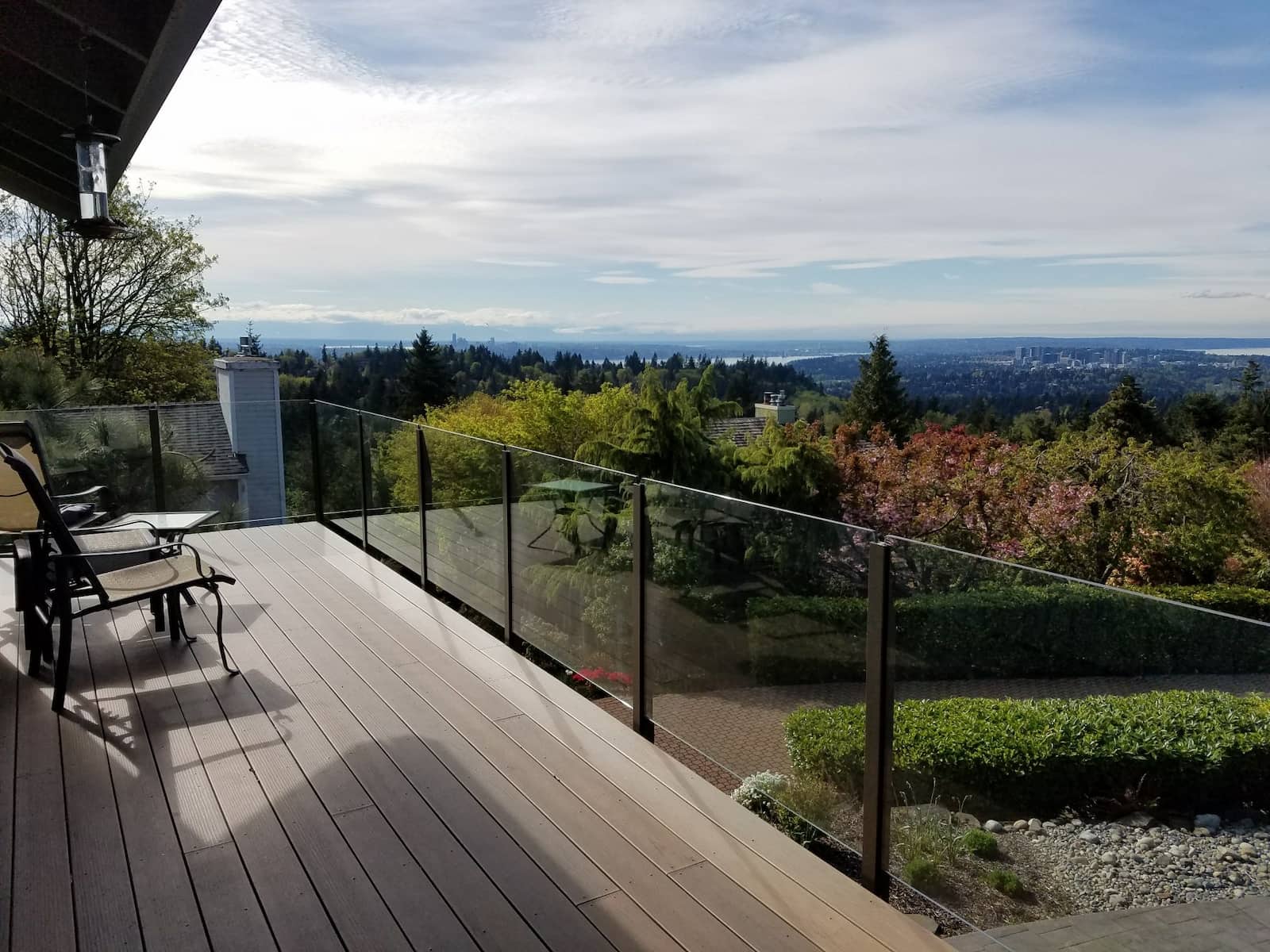 Fascia mounted infinity topless glass railing in Rideau Brown on a residential deck in the Seattle, Washington area