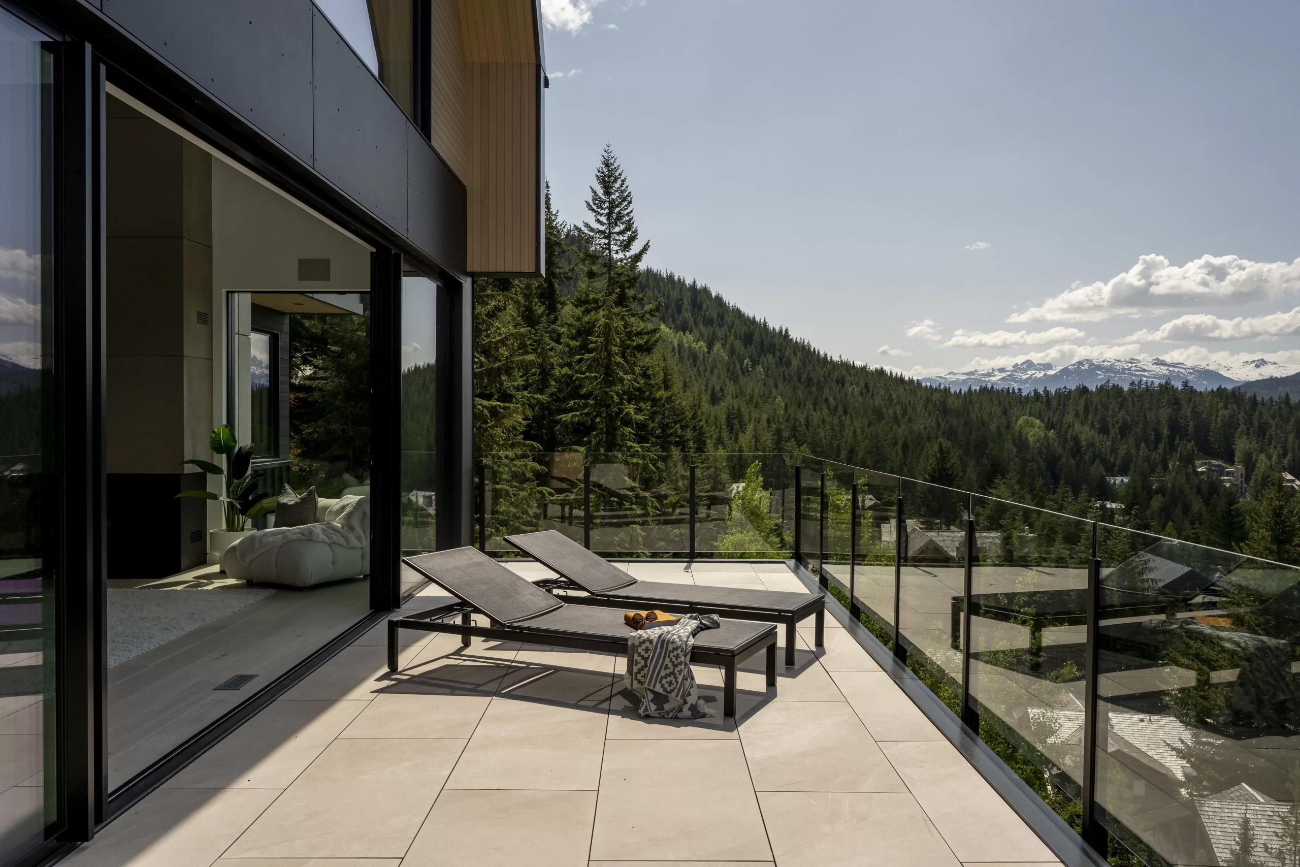 Aluminum glass deck railing installed on a modern residential property showing unobstructed views