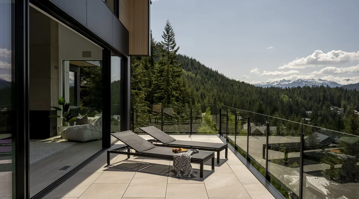 Aluminum glass deck railing installed on a modern residential property showing unobstructed views