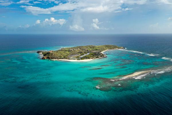 Aerial view of yacht on water.