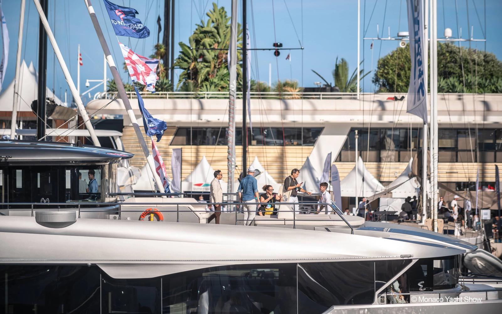 Modern yacht docked at marina.