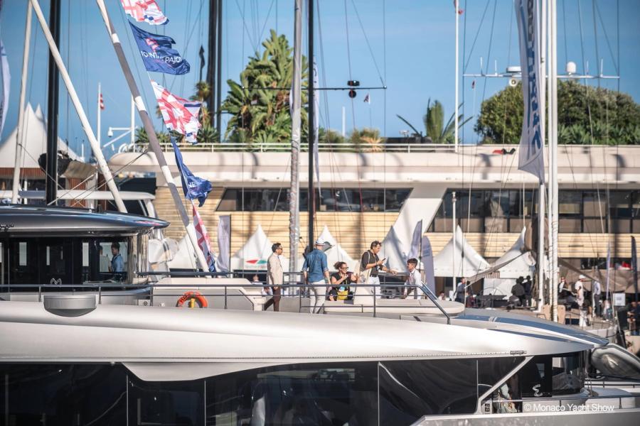 Modern yacht docked at marina.
