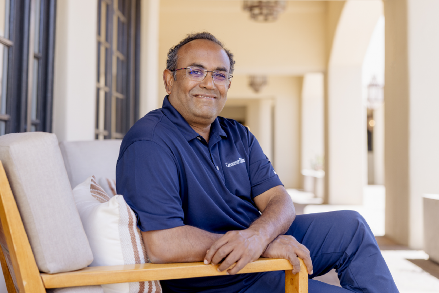 Kannan Alagappan smiling for Consumer Cellular.
