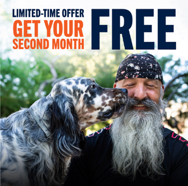 Dog licking a man's face with text reading Limited-time Offer, get your second month FREE