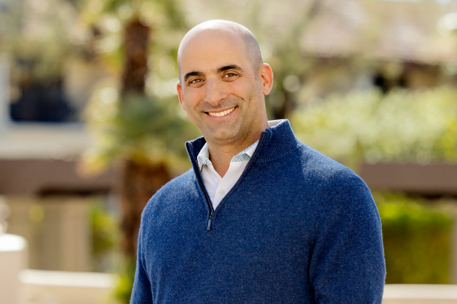 Craig Lister smiling for Consumer Cellular.