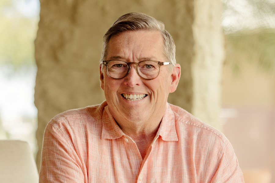 Ed Evans smiling for Consumer Cellular.