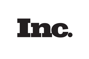 Inc logo in black and white.