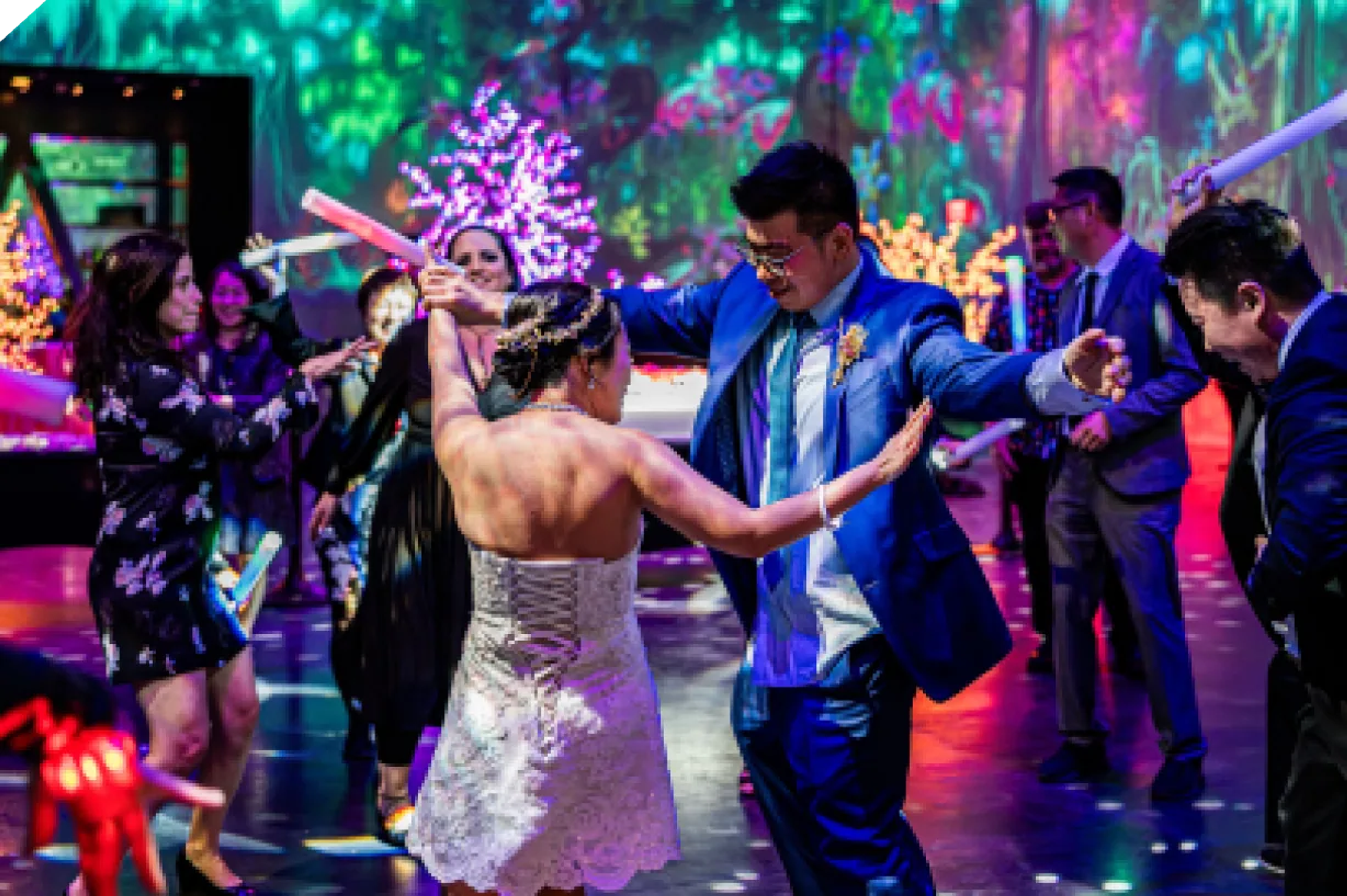 Newlyweds celebrating their wedding on the dance floor at AREA15