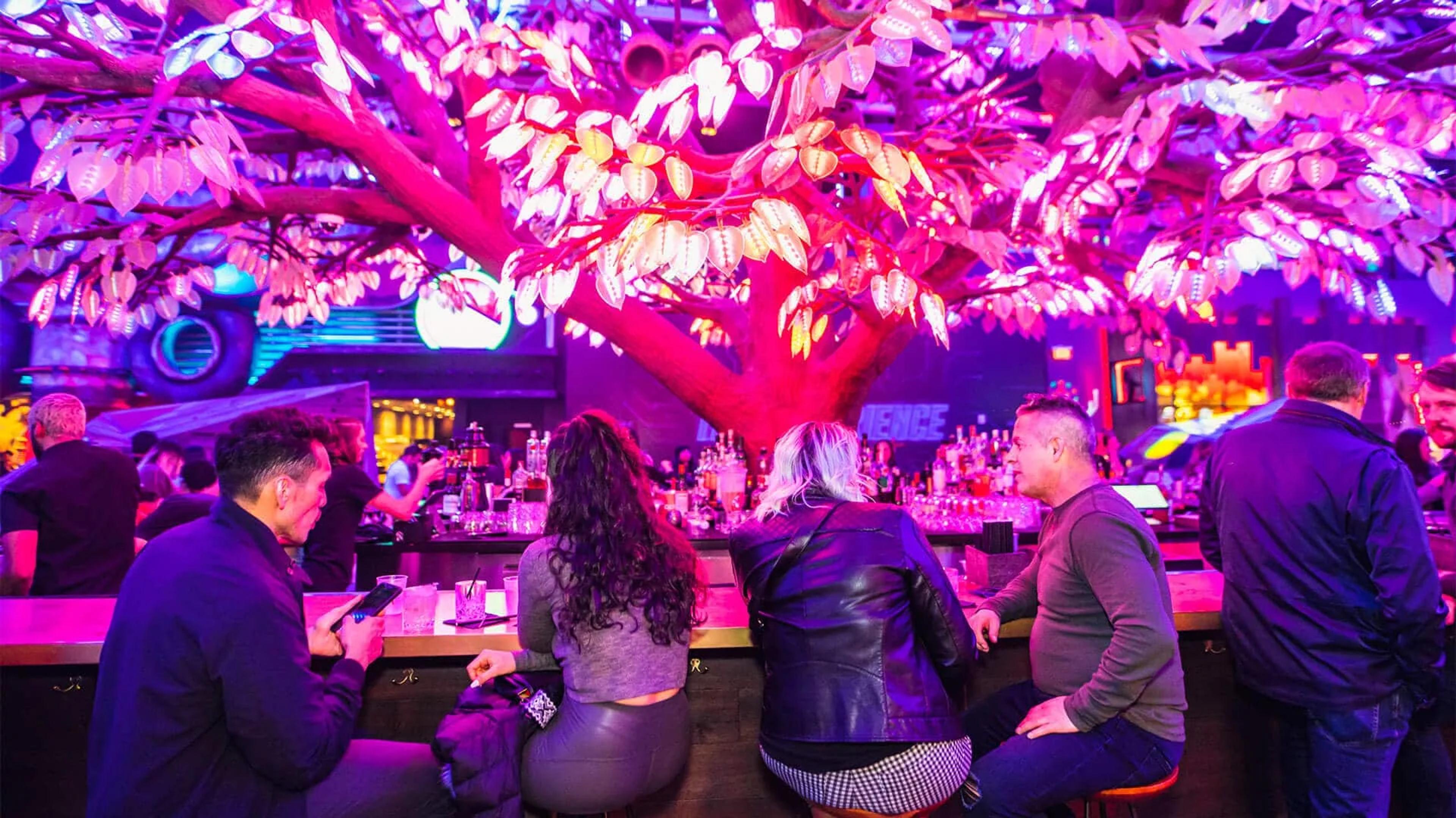 Guests sitting at the Oddwood bar