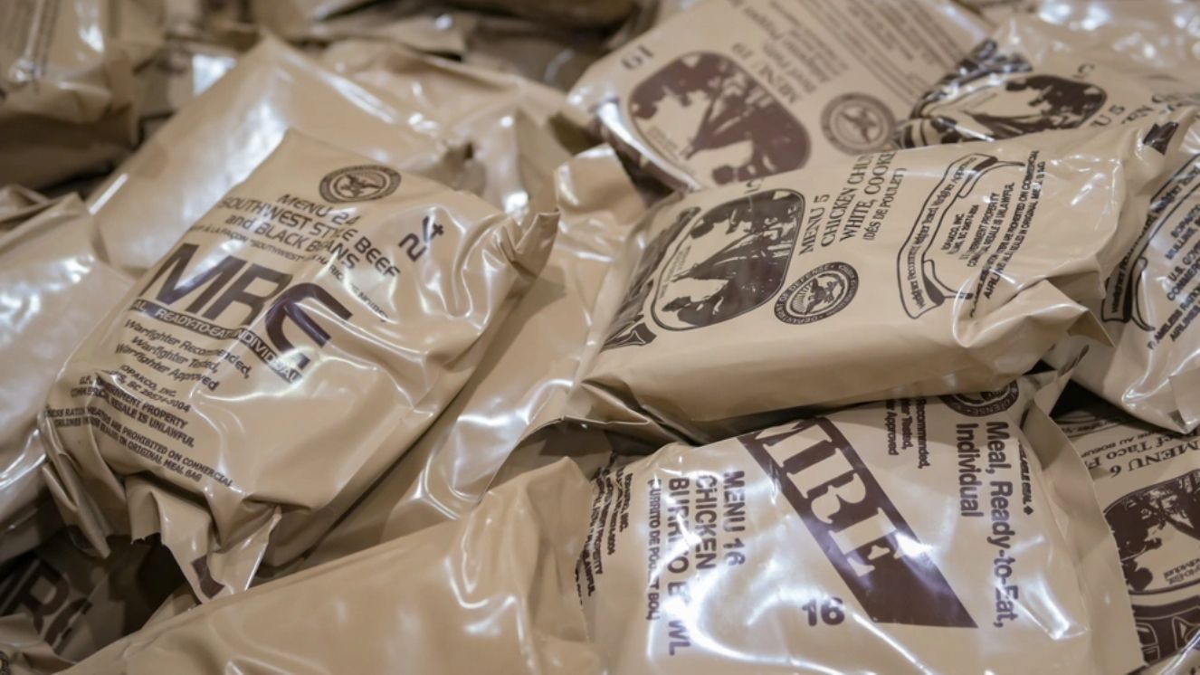 A supply of Meals Ready-to-Eat (MREs) is prepared for distribution to 944th Fighter Wing Reserve Citizen Airmen during Exercise Desert Hammer 25-1 at Luke Air Force Base, Ariz., Nov. 13, 2024.