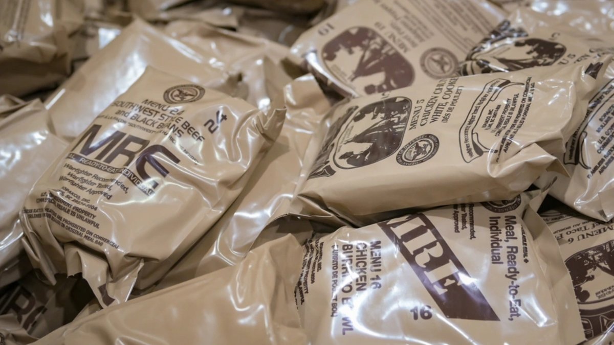 A supply of Meals Ready-to-Eat (MREs) is prepared for distribution to 944th Fighter Wing Reserve Citizen Airmen during Exercise Desert Hammer 25-1 at Luke Air Force Base, Ariz., Nov. 13, 2024.